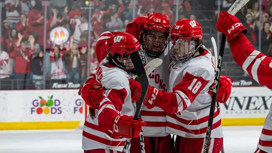 Ben Dexheimer, Carson Bantle and Owen Lindmark celebrate a goal