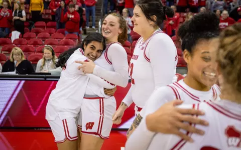 Leena Patibandla hugging Brooke Schramek