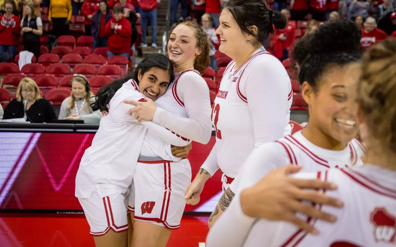 Leena Patibandla hugging Brooke Schramek
