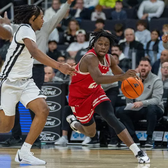 John Blackwell drives against a Providence player