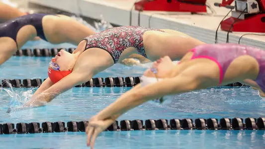 Phoebe Bacon starts in the backstroke