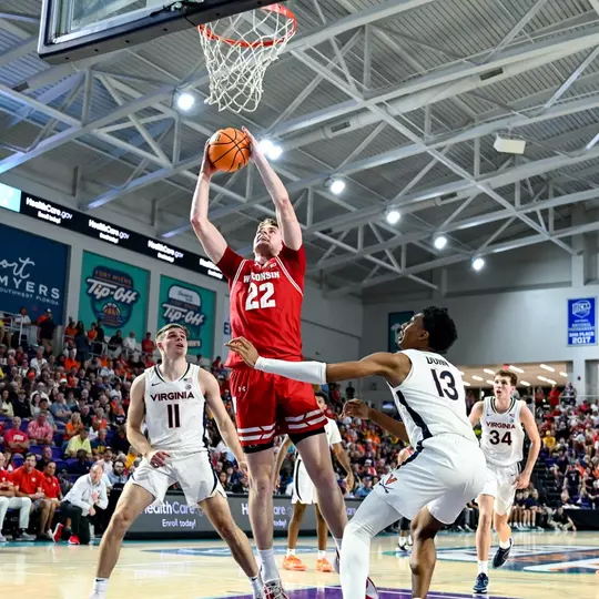 Steven Crowl (22) against Virginia