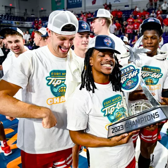 Kamari McGee (4) and Carter Gilmore (14) celebrate against SMU
