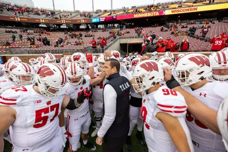 Wisconsin Badgers huddle prior to a Big Ten Conference NCAA college football game against the Minnesota Golden Gophers, Saturday, Nov. 25, 2023, in Minneapolis, Min. The Badgers won 28-14. (Photo by David Stluka/Wisconsin Athletic Communications)