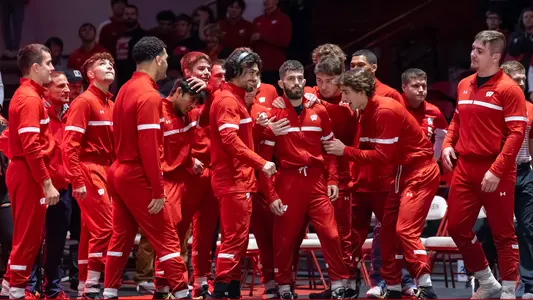 Wisconsin wrestling senior Eric Barnett, the starter at 125 pounds, is hyped up by teammates for the Badgers' introductions prior to the home dual match vs. Lindenwood on Sunday, Nov. 5, 2023 at the UW Field House in Madison, Wisconsin.