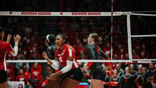 Devyn Robinson celebrates in match vs Illinois
