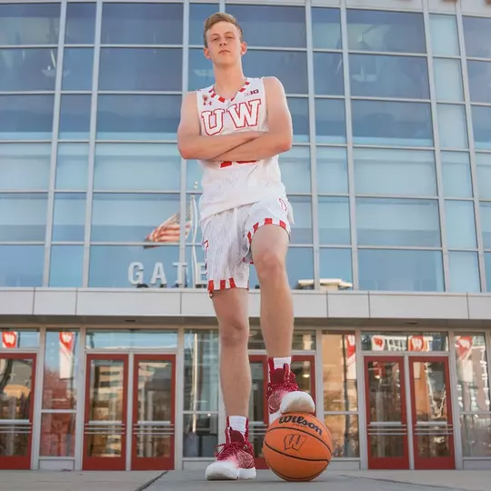 Jack Robison poses for a photo outside of the Kohl Center