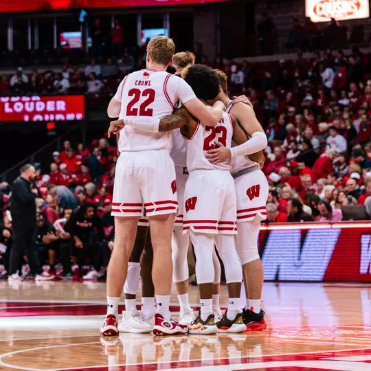 The Badgers huddle up