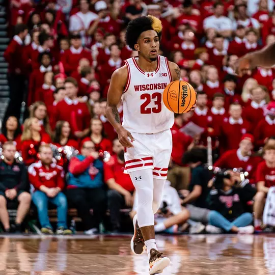 Chucky Hepburn dribbles up the court