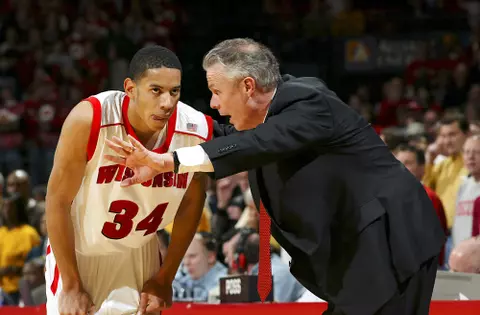 Madison, Wisconsin - 12/20/03. University of Wisconsin guard Devin Harris (34) listens to head coach Bo Ryan during the Marquette game at the Kohl Center. Wisconsin beat Marquette 63-59. ©David Stluka
