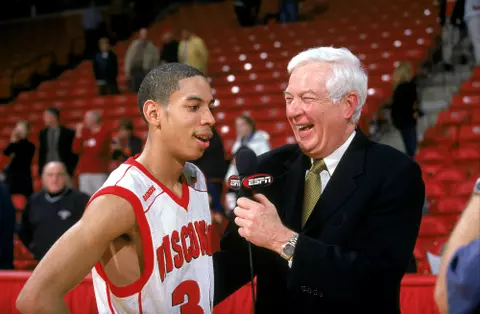 University of Wisconsin guard (34) Devin Harris chats with ESPN's Bill Rafferty after the Iowa game at the Kohl Center on 2/19/02. Wisconsin beat Iowa 64-56.