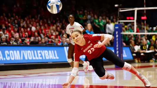 Julia Orzol goes for a one-handed dig