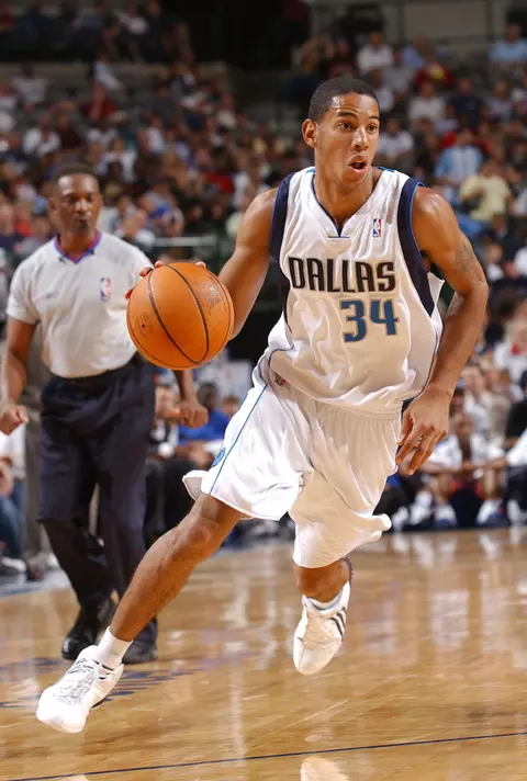 DALLAS - OCTOBR 21:  Devin Harris #34 of the Dallas Mavericks dribbles up the court against the New York Knicks on October 21, 2004 at the American Airlines Center in Dallas, Texas.  NOTE TO USER:  User expressly acknowledges and agrees that, by downloading and or using this photograph, User is consenting to the terms and conditions of the Getty Images License Agreement.  Mandatory Copyright Notice:  Copyright 2004 NBAE  (Photo By Glenn James/NBAE via Getty Images)