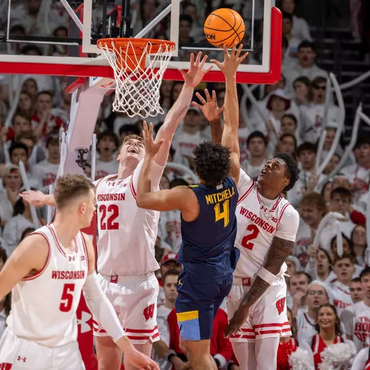 Steven Crowl (22) and AJ Storr (2) against Marquette