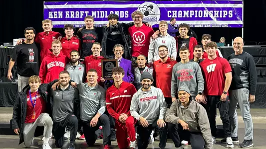 Wisconsin wrestling team photo at 2023 Midlands Championships. The Badgers finished second overall with four placewinners, including two champions - Dean Hamiti at 165 pounds and Shane Liegel at 184 pounds. The tournament was held on Friday, Dec. 29 and Saturday, Dec. 30, 2023 at NOW Arena in Hoffman Estates, Illinois and hosted by Northwestern University.