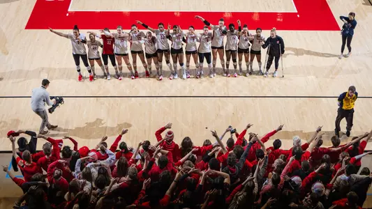Volleyball team sings Varsity with student section