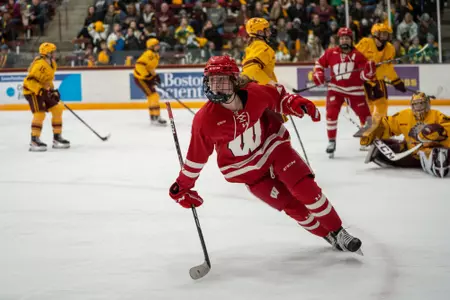 Caroline Harvey celebrates as she scores a goal against Minnesota