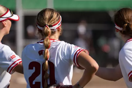 Softball players with back to camera