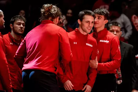 Garrett Model, Wisconsin, wrestling, is hyped up by his teammates Trent Hillger and Dean Hamiti prior to the Badgers dual match against Purdue on Friday, January 20, 2023 at the UW Field House in Madison, Wisconsin.