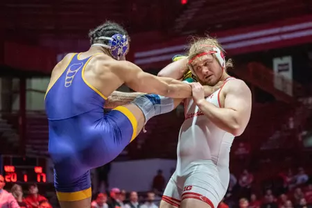 Trent Hillger, Wisconsin Wrestling, locks up a high single leg of his heavyweight opponent Tyrell Gordon en route to a 2-1 decision victory during Wisconsin's dual match against Northern Iowa on Saturday, February 18, 2023 at the UW Field House in Madison, Wisconsin.