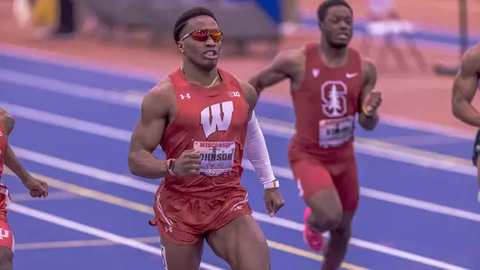 Lawrence Johnson crosses the finish line in the 60 meters