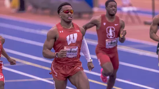 Lawrence Johnson crosses the finish line in the 60 meters
