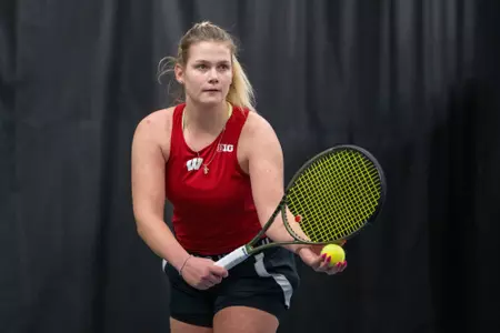 Maria Sholokhova preparing to serve