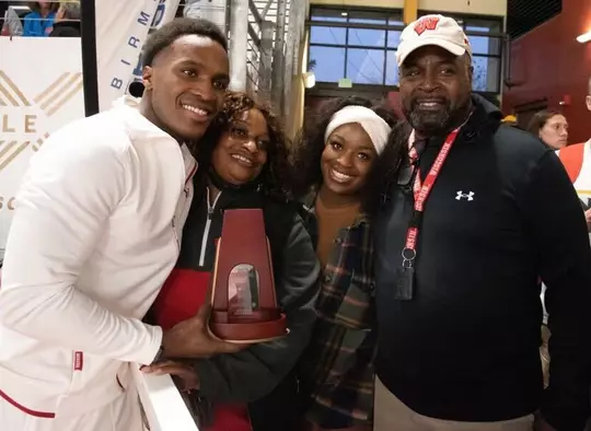 L.O. Johnson with his parents and sister
