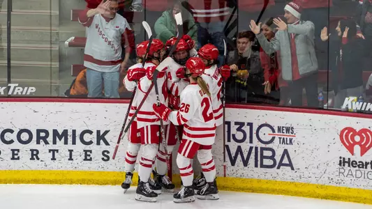 Wisconsin women's hockey celebrates a goal against Minnesota State in a playoff game on Feb. 24, 2023 at LaBahn Arena