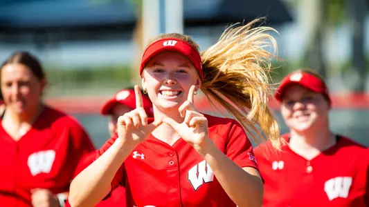 Casey Fountain throwing up the Badger 'W'