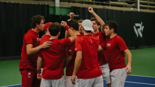Team huddle vs. Western Michigan