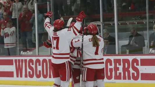 Wisconsin women's hockey celebrates a goal against St. Cloud State in a game on Feb. 4, 2023 at LaBahn Arena