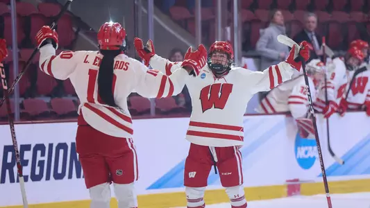 The Badgers celebrate one of their goals in their 9-1 win over LIU on Thursday night at the Class of 1965 Arena in Hamilton, N.Y.