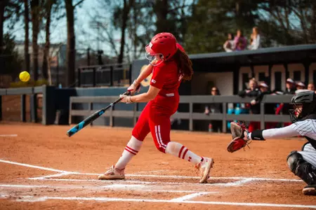 Ellie Hubbard hitting the ball