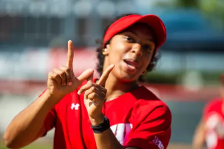 Alyssa Mclelland holding up the Badger 'W'