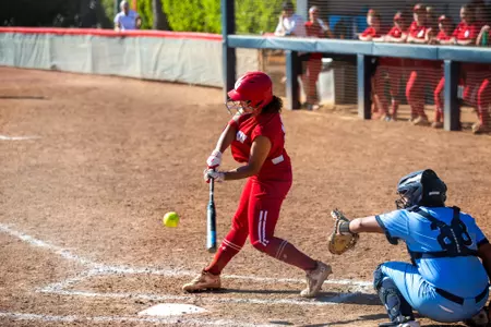 Bree Mitchell hitting the ball