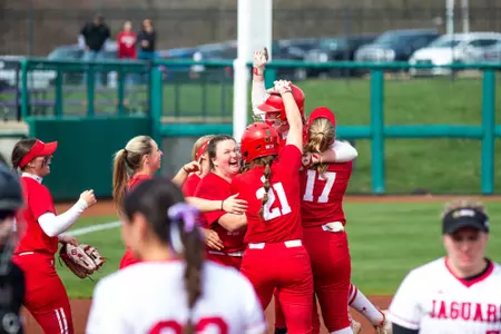 Emily Bojan being celebrated after game winning hit