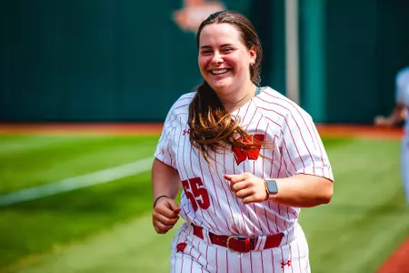 Eden Dempsey smiling and running