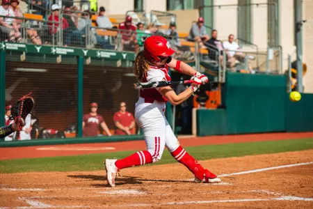 Kate Linkletter hitting the ball