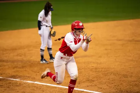 Ava Kuszak rounding the bases after home run