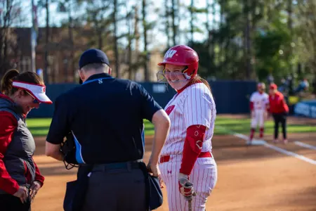 Kayla Konwent smiling with umpire