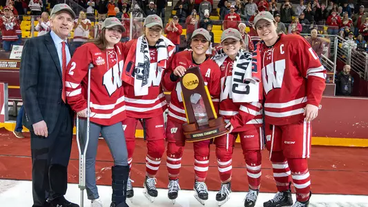 Wisconsin Women's Hockey Captains and Mark Johnson with the NCAA Trophy
