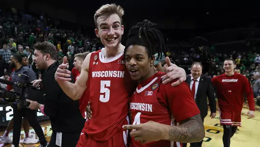 Tyler Wahl and Kamari McGee celebrate a win at Oregon
