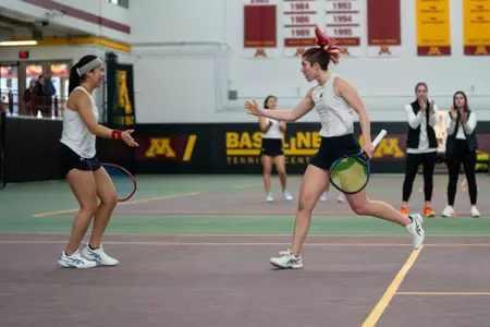 Charmaine Seah and Taylor Cataldi celebrate against Iowa