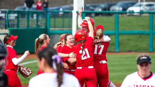 Emily Bojan being celebrated by her teammates