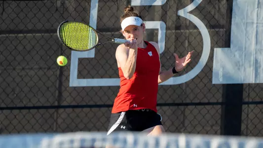 Ava Markham midstrike of a forehand shot
