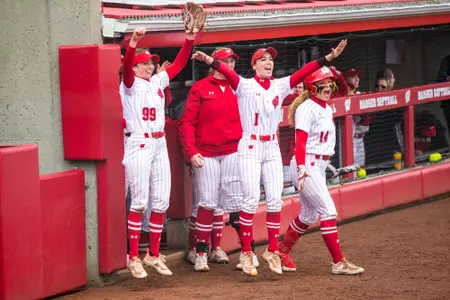 Badger softball players celebrating