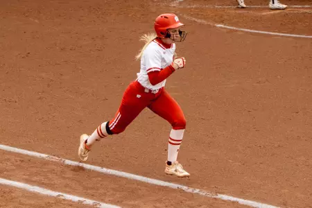 Katie Keller running to first base