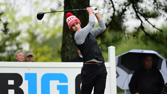 Cameron Huss finishes a swing at the 2023 Big Ten Championship