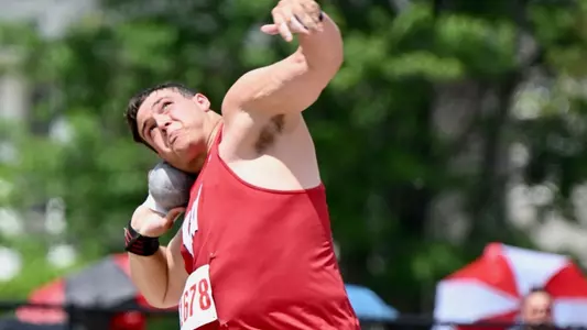 Jason Swarens competes in the shot put